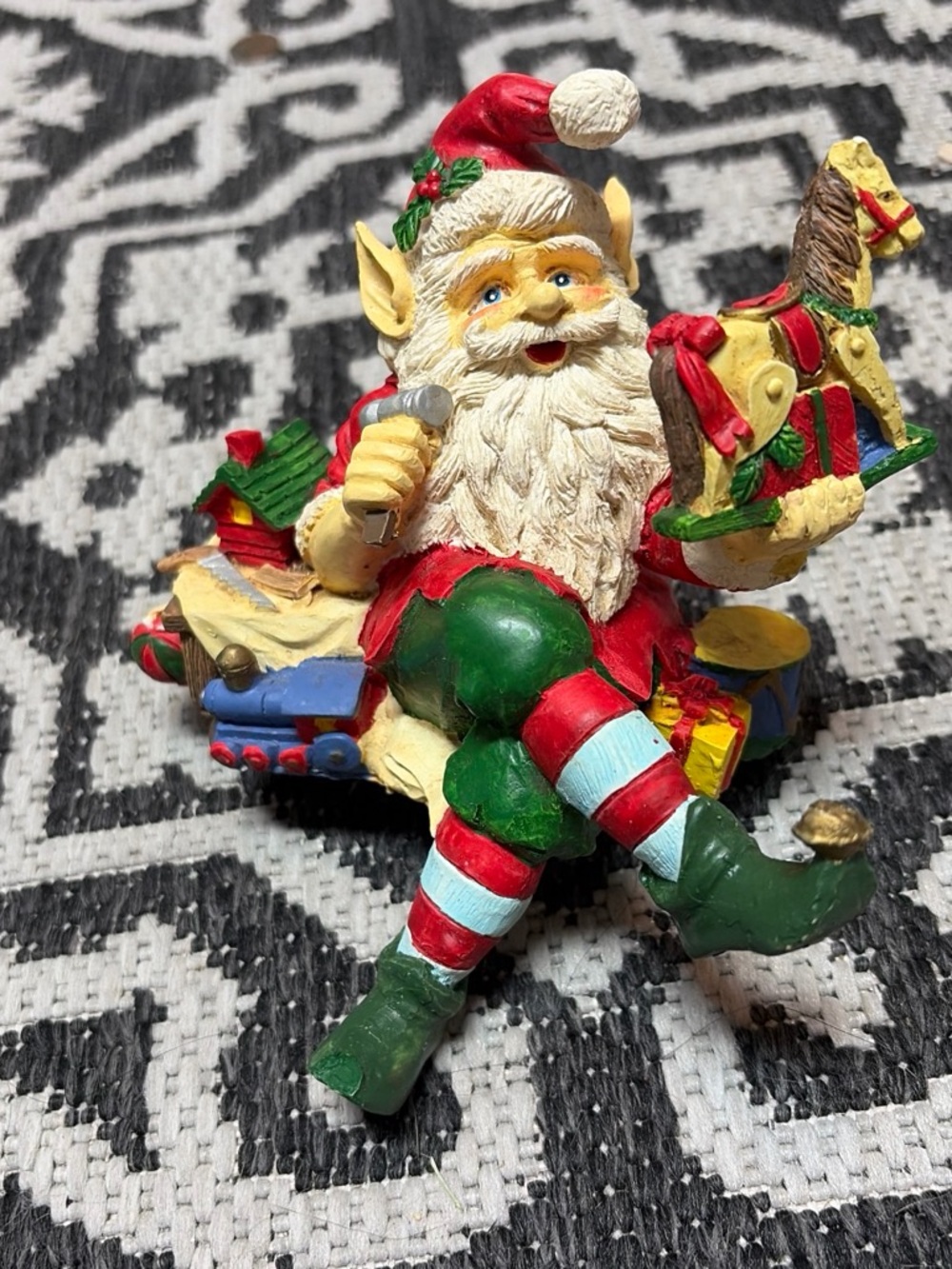 Festive Elf Santa Figurine with Toy Horse